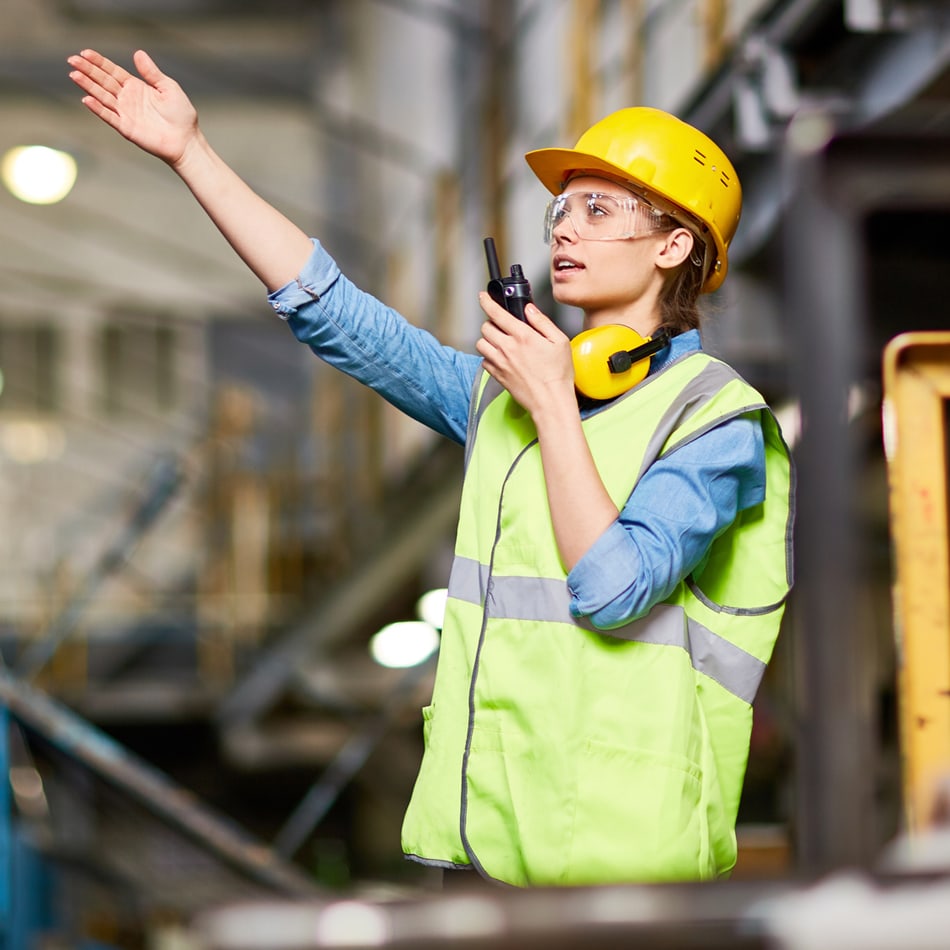 Occupational safety and health professional working in warehouse