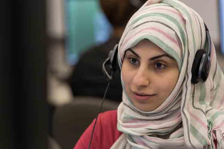 ESL learner wearing a headset